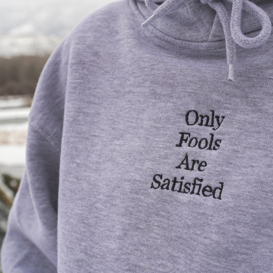 Only Fools Are Satisfied Unisex Hoodie
